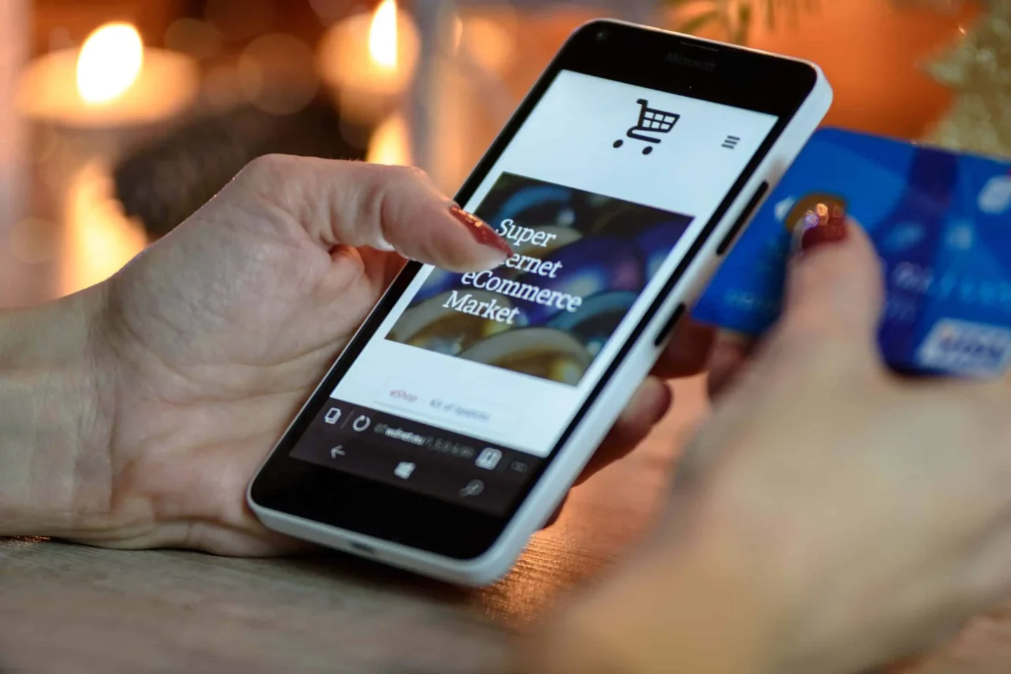 Woman paying with her phone/credit card