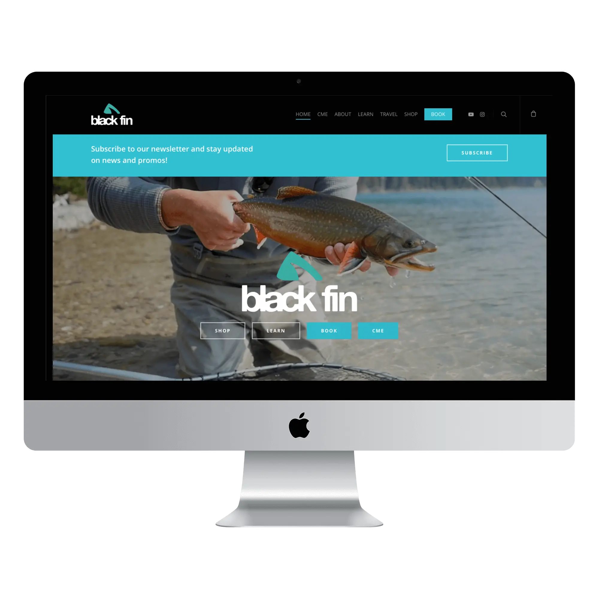Black fin website computer mockup - web design firm Big Red Jelly.