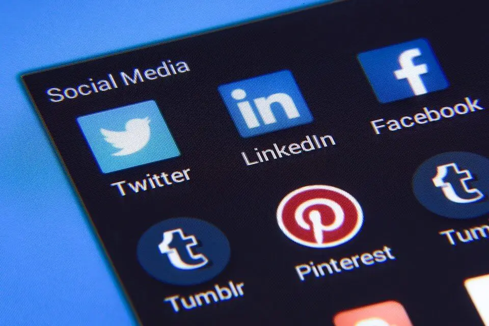Social media icons on mobile phone - Big Red Jelly marketing agency.