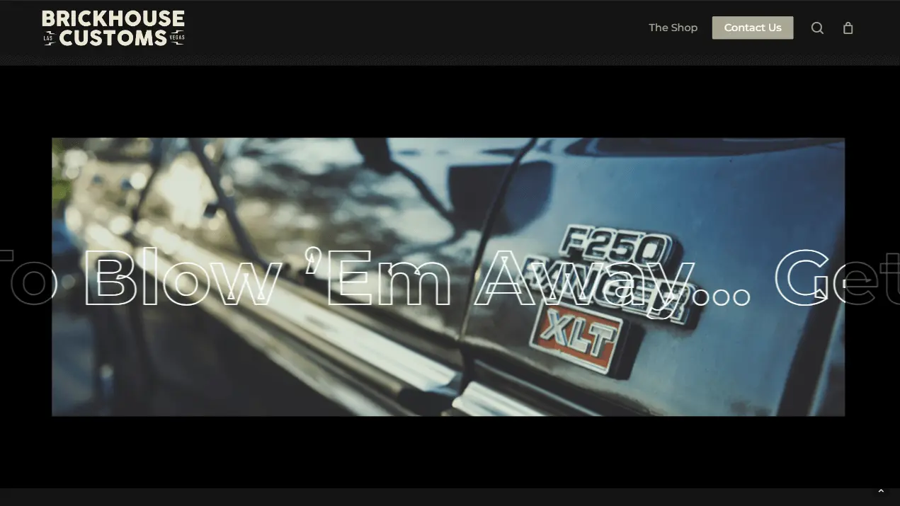 Portfolio - Brickhouse Customs - 5 Close-up of a black Ford F-250 XLT truck with the model badge visible on the door. The Brickhouse Customs logo, navigation menu, and large, semi-transparent text overlay appear on the screen.