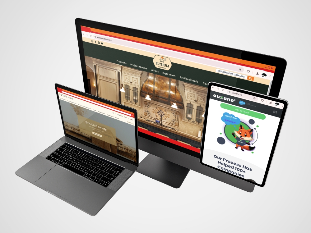 Three devices displaying different websites: a laptop with an architectural site, a desktop monitor with a restaurant site, and a tablet with a business site, all shown on a white background.