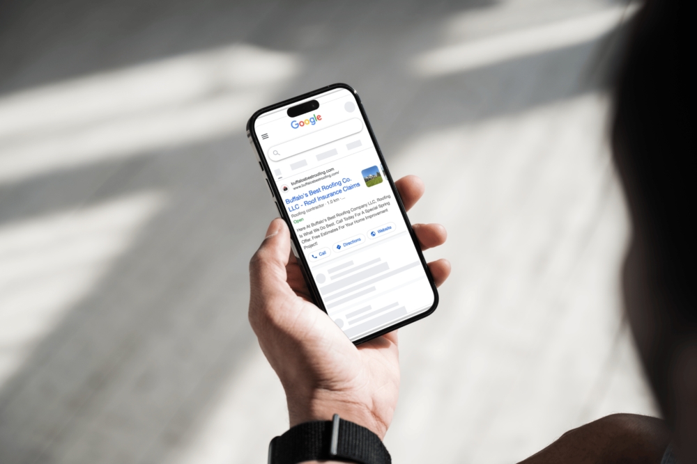 A person holding a smartphone displaying high-ranking Google search results for a business, representing rapid online visibility.