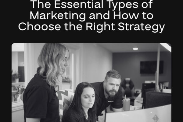 Three coworkers, two women and one man, collaborate at a desk with computers in an office. The image highlights the types of marketing and how to choose the right strategy, with the Big Red Jelly logo at the top.