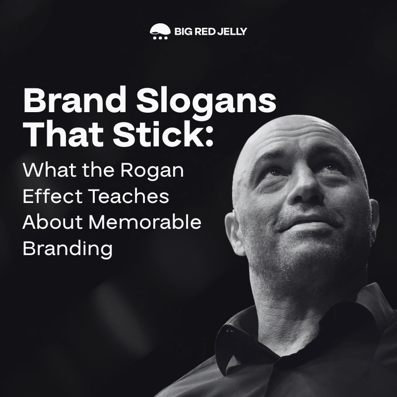 A man looks upward on a black-and-white background with the text: Brand Slogans That Stick—exploring Types of Marketing and what the Rogan Effect teaches about memorable branding. The Big Red Jelly logo appears at the top.