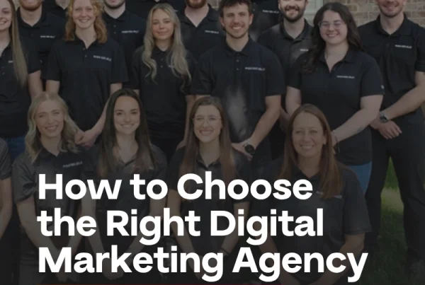 A group of people in matching black polo shirts stands and sits outside a brick building. Overlaid text reads, How to Choose the Right Digital Marketing Agency for Your Business.