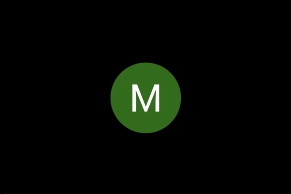 A green circle with a white, bold letter M in the center, set against a solid black background.