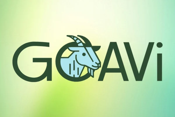 The word GOAT is written in large letters with a goats head illustration replacing the letter O. The background is a soft gradient of green and blue.