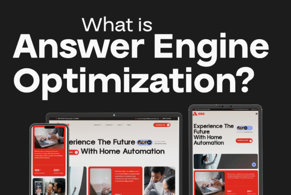 Three devices—a smartphone, laptop, and tablet—display the same website with “What is Answer Engine Optimization?” above them on a black background, highlighting strategies to boost website traffic conversion.